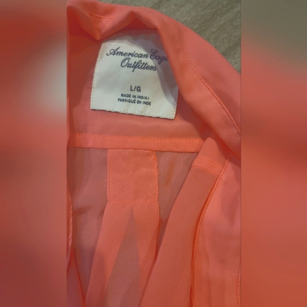 Neon pink blouse